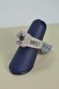 Ladies 18k white gold ring . In addition, there are bead set round 