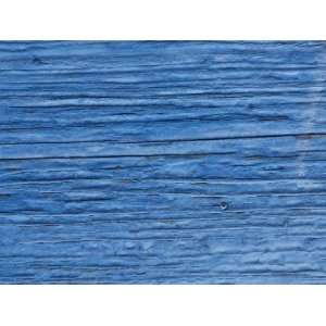 Close Up of Wooden Surface with Blue Paint Peeling in New Orleans 