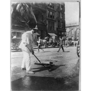  New York City sanitation dept. sweeping street,c1910