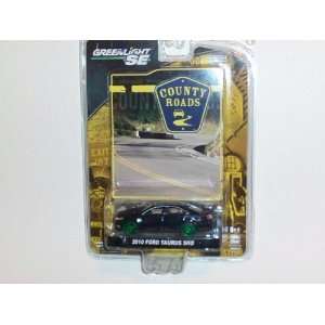   Edition 164 Scale 2010 Ford Taurus SHO Green Machine Toys & Games