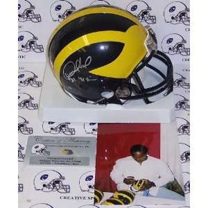 Desmond Howard   Riddell   Autographed Mini Helmet Michigan Wolverines