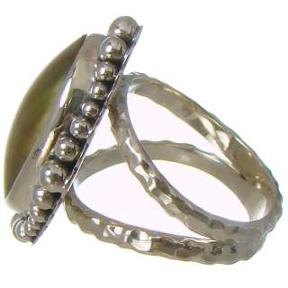 Sterling Silver Mabe Pearl ring. The ring is accented by sterling 