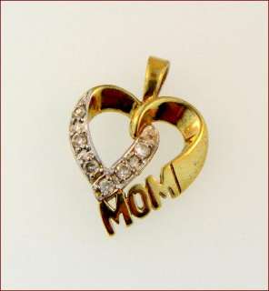 ladies CZ heartpendant set in Sterling Silver Plated with Gold.