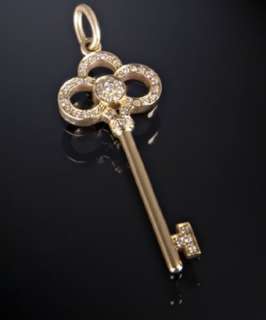 Tiffany & Co. diamond and gold crown key pendant   