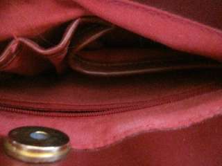 Rosetti, dark red, waxy, leather, purse with lots of compartments 